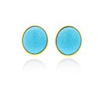 BARBARA - An oval shaped earring with thin metal border, a charge of light on your face!
Jewel made of light gold and turquoise resin. - A.Z. Bigiotterie