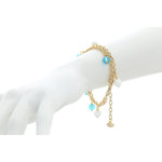 AZZURRA - AZZURRA is a bracelet made in light gold and turquoise and white spheres: it  can be worn everyday as it has delicate and refined tones. - A.Z. Bigiotterie